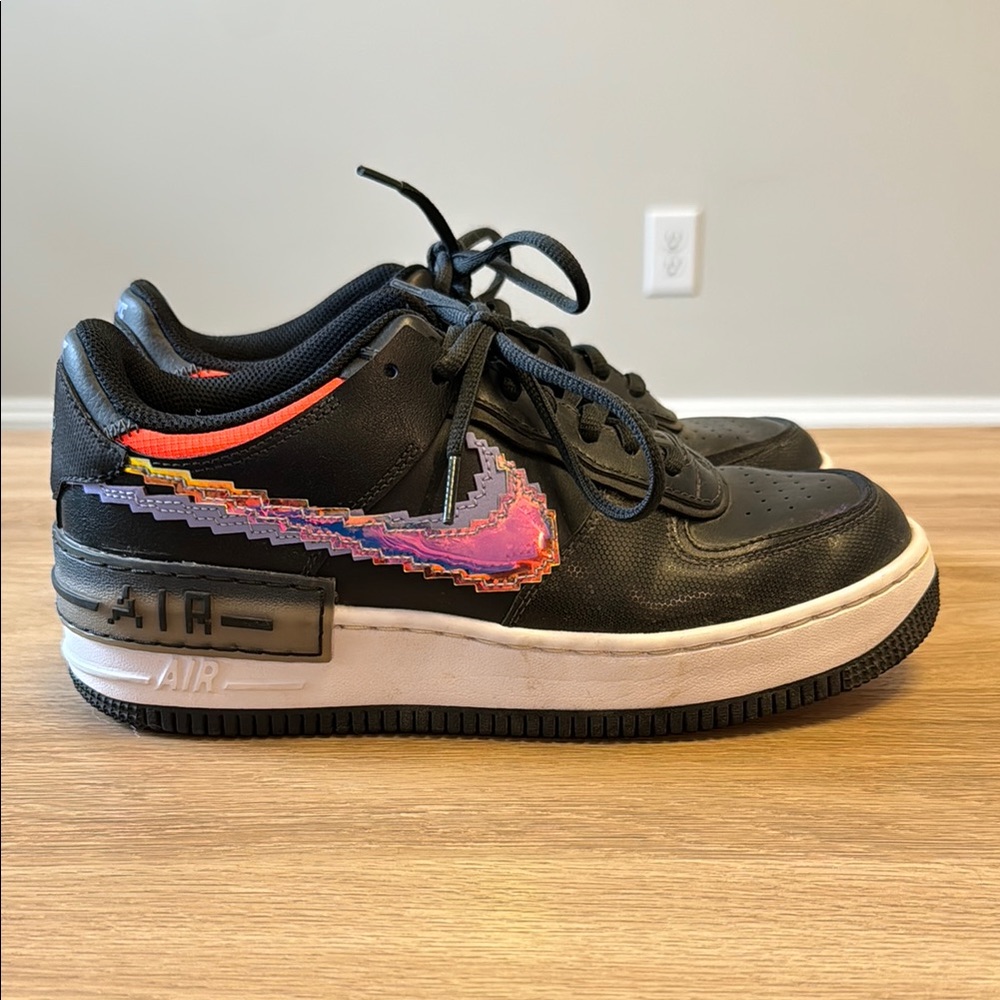 Nike Air Force 1 | Black and orange iridescent pixel swoosh | Women’s Size 9